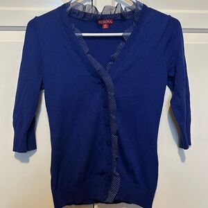 Blue cardigan with ruffles